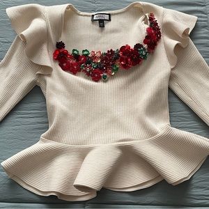 Peplum holiday sweater